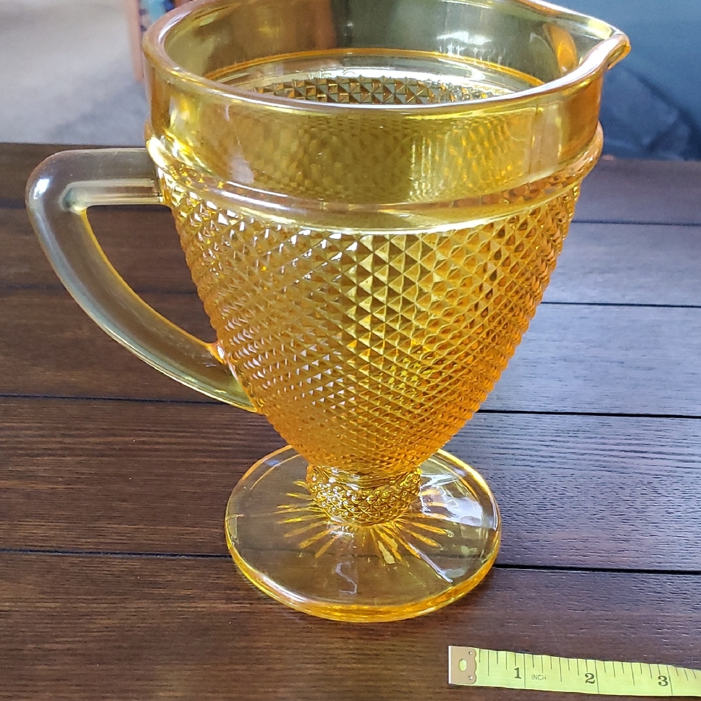 Elegant Gold Glass Pitcher